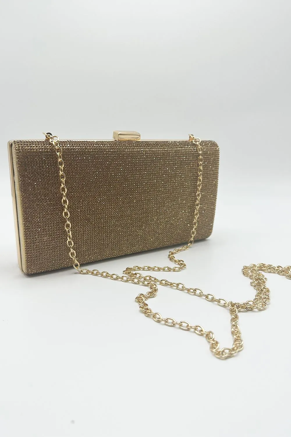 Carna Diamante Embellished Rectangle Clutch Bag in Gold